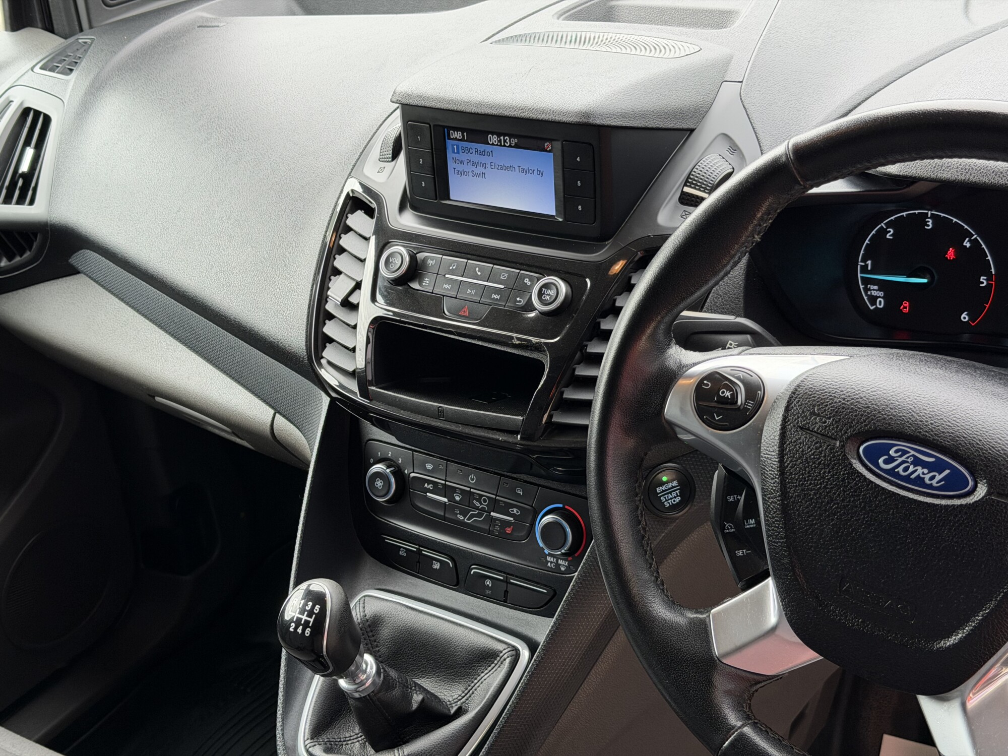 Ford Transit Connect dashboard with manual gearbox and radio display