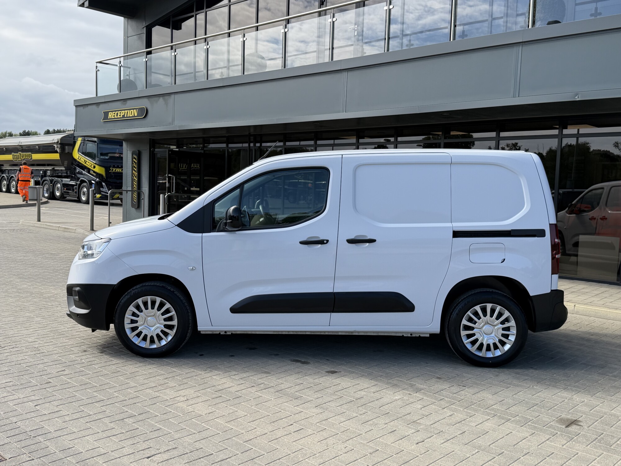 Side view of white Toyota Proace City van outside Tru7 Group reception